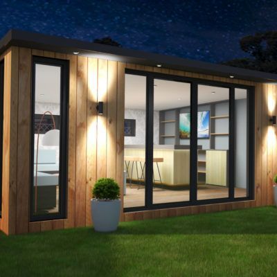 side profile of a garden room at night
