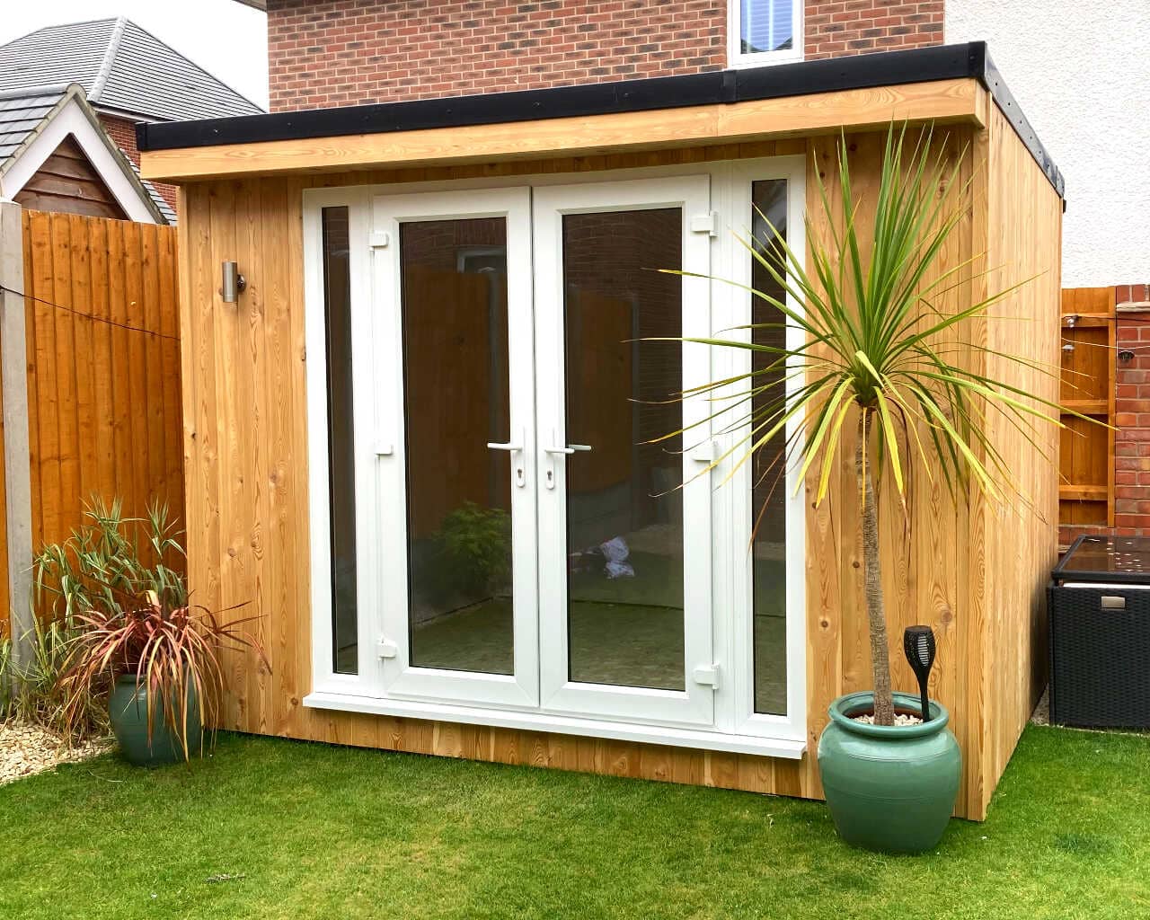 garden room with plant pots
